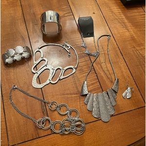 A lot of paparazzi silver jewelry.